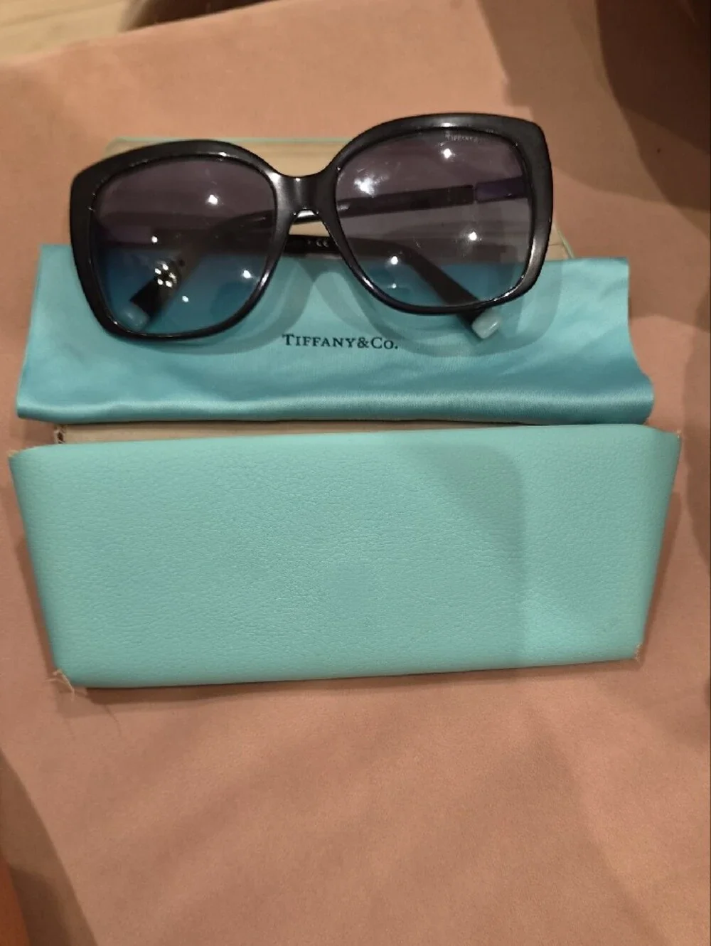Tiffany & Co. Black Cat-Eye Sunglasses with Purple-Tinted Lenses